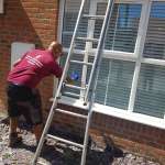 window cleaner cleaning window