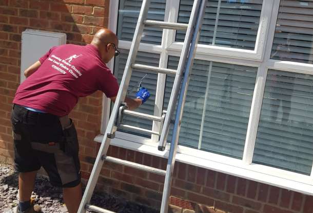 window cleaner cleaning window
