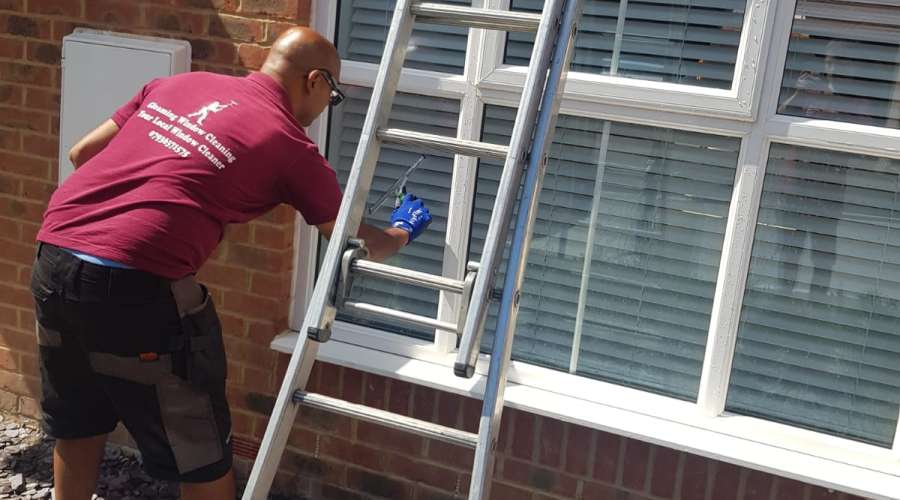 window cleaner cleaning window